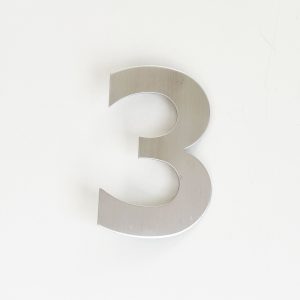 NUMERO ACERO 120 MM TRES